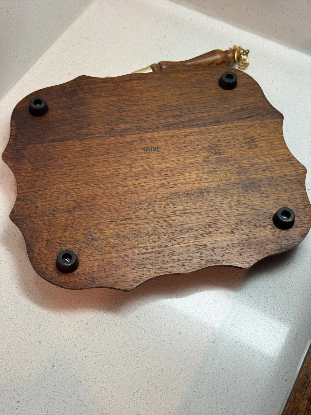 Vintage cheese board with matching knife.